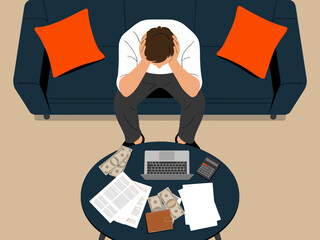 Stressed businessman with head in hands sitting on sofa at home with bills laptop calculator and money depicting financial problems debt crisis and economic downturn for business concept stress manage
