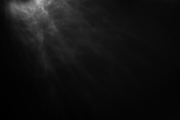 Paper abstraction. Highlights and shadows on black cardboard