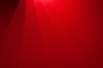 Paper abstraction. Shadows and highlights on red cardboard. Colored cardboard