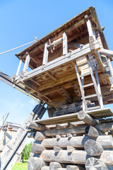 Historic Wooden Windmill in Rural Setting
