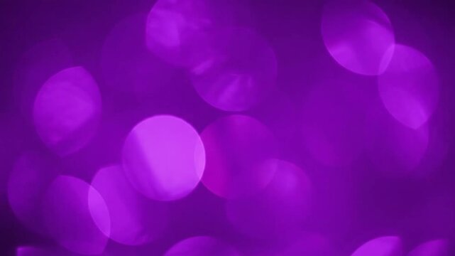 Abstract purple bokeh background with soft focus light effect for various uses