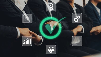 Business professionals shaking hands with technology and icons representing partnership, success,...