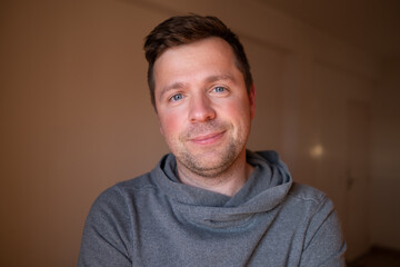 Fototapeta premium Confident mature male posing with a friendly expression, concept of stability and trust.