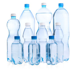 Naklejka premium Water bottles of different sizes isolated on white