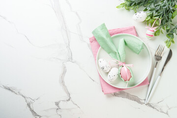 Easter food with decorations on white background.