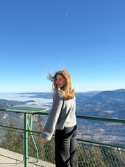 girl on the top of the mountain