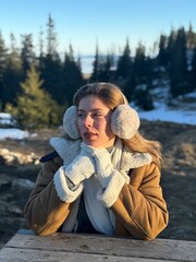 girl on the top of the mountain