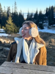 girl on the top of the mountain