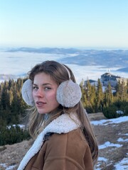 girl on the top of the mountain