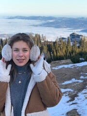 girl on the top of the mountain