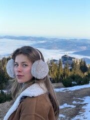 girl on the top of the mountain