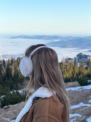 girl on the top of the mountain