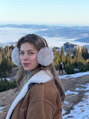 girl on the top of the mountain