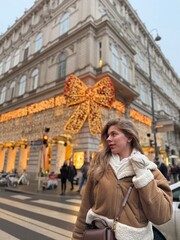 young woman in winter park in Austria