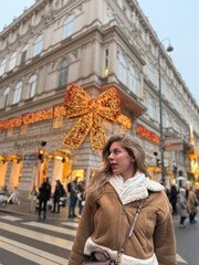 young woman in winter park in Austria