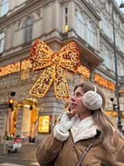 young woman in winter park in Austria