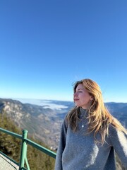 girl on the top of the mountain