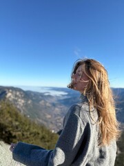 girl on the top of the mountain
