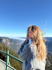 girl on the top of the mountain