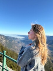 girl on the top of the mountain