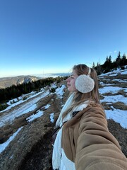 girl on the top of the mountain