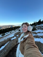 girl on the top of the mountain