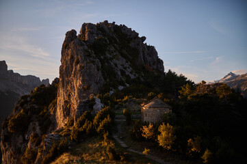 Sunset over Punton de las Brujas rock formation on the Hermitages route in Tella Pyrenees mountains Spain