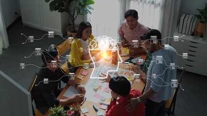 An engaging overhead view of a diverse team collaborating in a modern office, utilizing mind mapping techniques and post-it notes to generate innovative ideas through effective communication. Raster