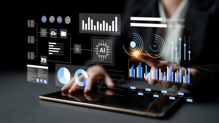 A business professional engages with an advanced digital dashboard featuring graphs and AI analytics, showcasing modern technology in a sleek office setting. Gantry