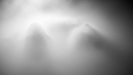 Ethereal mountains shrouded in a mystical fog.