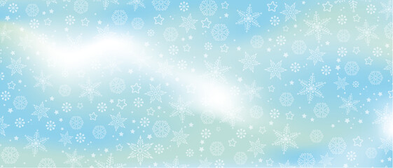 Winter background with white snowflakes on light blue gradient, banner format