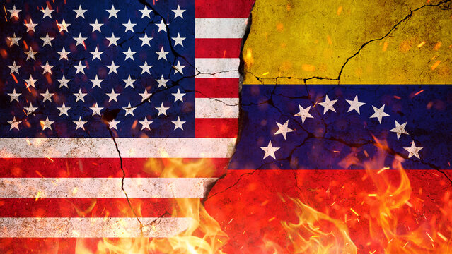 USA and Venezuela Flags Conflict and Crisis Concept. powerful conceptual image showing the USA and Venezuela flags on a cracked wall with fire and sparks.