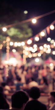 Festive night market with blurred lights and crowds