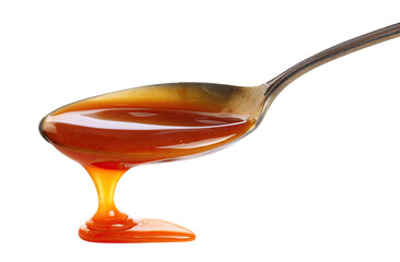 Caramel sauce drips from a spoon (3)