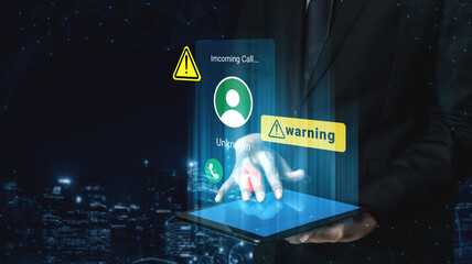 A businessman interacting with a digital tablet showing a warning alert for an incoming call from an unknown number against a high-tech city backdrop. Gantry