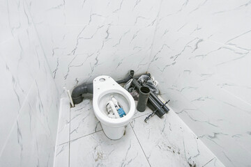 the toilet was clogged and water ran through, a red rag to collect water from the drain corrugation. Urgent plumbing repairs