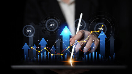 A hand interacts with a digital tablet displaying dynamic financial charts and growth metrics, symbolizing modern business analysis and strategy planning. Scalp
