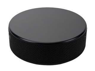 A black hockey puck sits on a white surface, simple and straightforward
