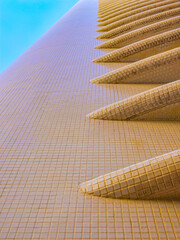 Horizontal blades covered in mosaic along futuristic residence building, Monaco