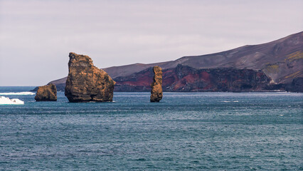 Sea Stacks in Deception Island Antarctica Colorful Vibrant Landscape. Close Up View From Cruise Ship