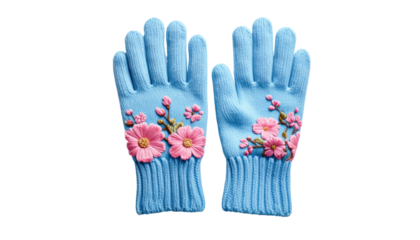 Close-up view of two light blue knitted gloves decorated with pink floral accents