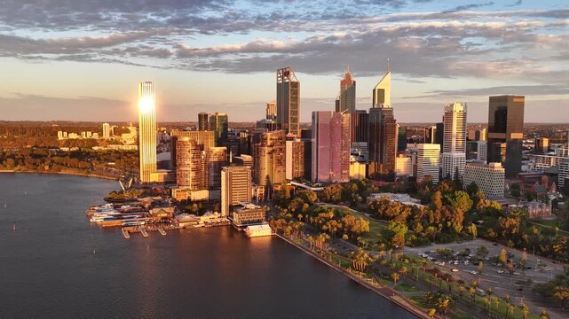 Perth City at Sunrise, Western Australia &ndash; 4K Aerial Drone Footage of Skyline, Swan River, Central Business District, CBD, Modern Skyscrapers, Waterfront Marina, Swan River and Golden Morning Light