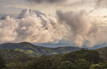Obraz premium Storm clouds over the landscape of Monteverde in Costa Rica looking west towards Pacific Ocean