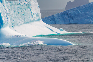 Antarctica Iceberg Wave Crashing. Epic Massive Floating Ice View From Ship. Frozen Landscape Nature...