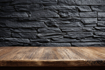 Wooden table on a black stone background. Bar counter. Old countertop. Mini production stage. Retro.