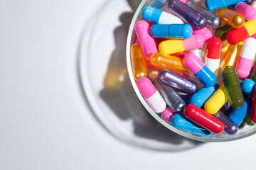 Close up of Colorful Pill Capsules in Various Bright Colors