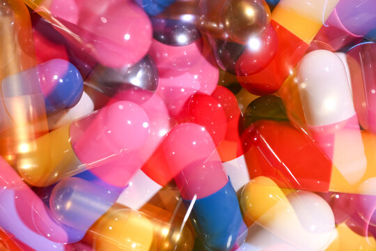 Close up of Colorful Pill Capsules in Various Bright Colors