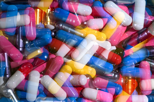 Close up of Colorful Pill Capsules in Various Bright Colors