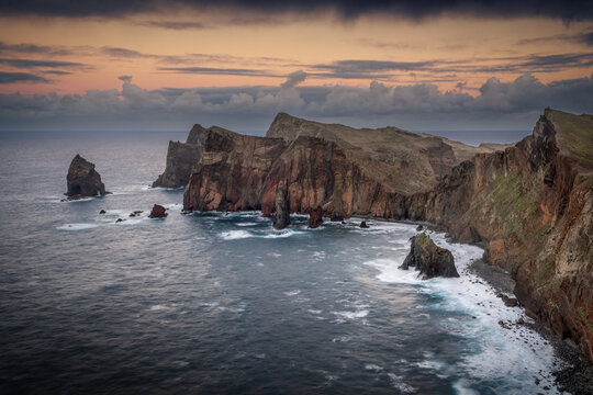 Ponta de Sao Lourenco at Sunset with Orange Sky and Clouds