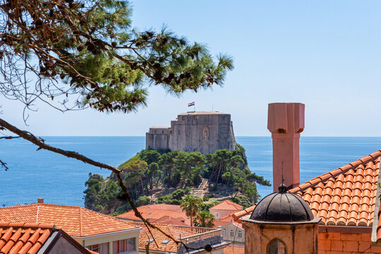 Lovrijenac Fortress, Dubrovnik, Croatia, May 1, 2022 &ndash; Lovrijenac Fortress rising above the Adriatic Sea, framed by red rooftops of Dubrovnik Old Town